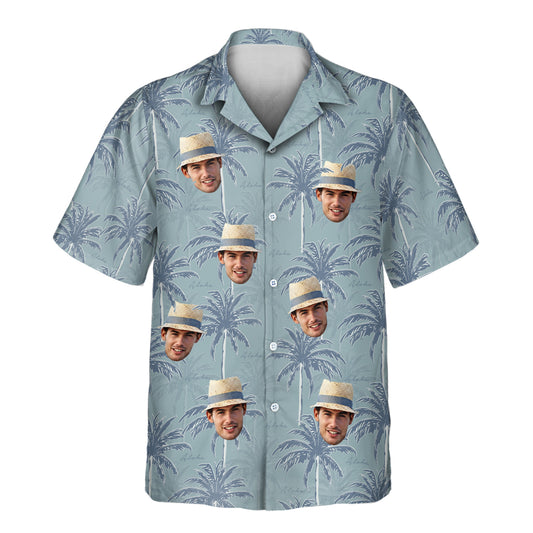 Custom Hawaiian shirts with navy blue palm trees on light blue. Add faces on them for a breezy, tropical look perfect for beach vacations or casual outings.
