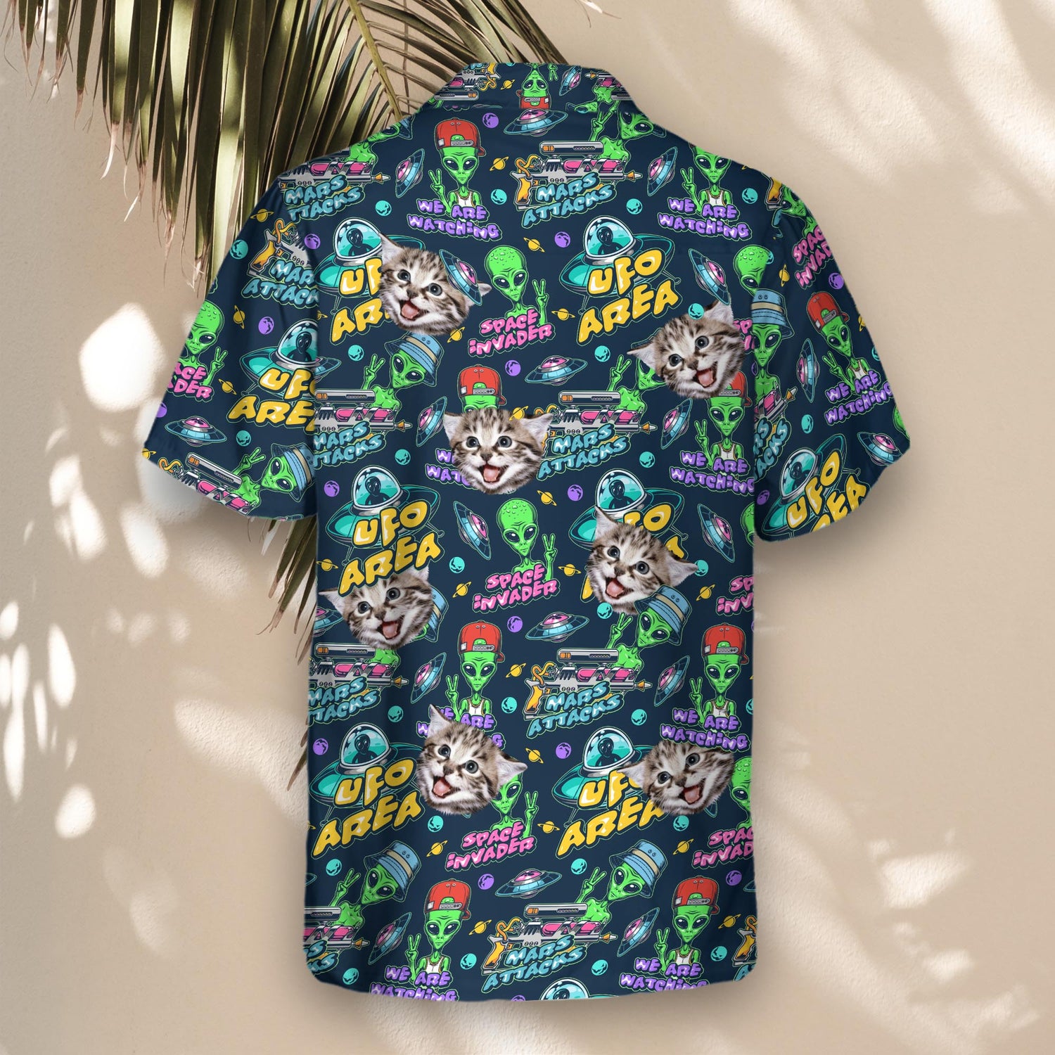 Cosmic custom Hawaiian shirts with faces on them, featuring flying saucers, alien landscapes, and starry skies, perfect for making a statement at any event.