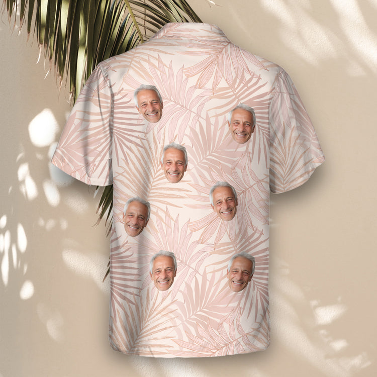 Blush pink custom Hawaiian shirts with faces on them, featuring tropical leaf designs, offering lightweight comfort and unique style for summer or tropical events.