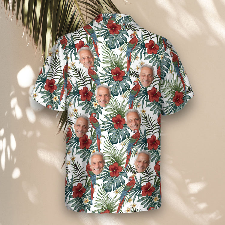 Custom Hawaiian shirts featuring vibrant macaw parrots, lush foliage, and exotic flowers—perfect shirts with faces on them for beach and resort wear.