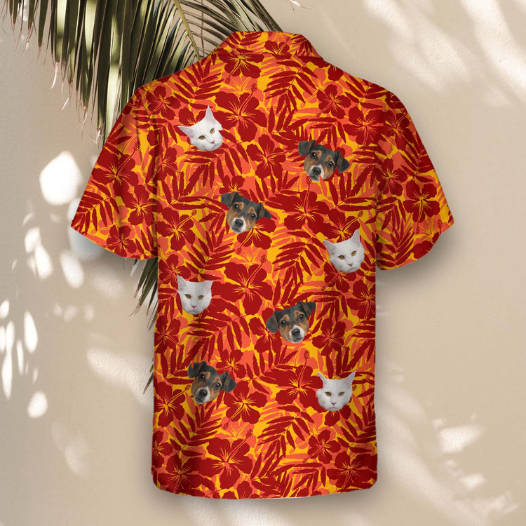 Custom Hawaiian shirts with faces on them, crafted with a relaxed fit and bold red and orange tropical flower silhouettes, palm leaves, and exotic plant details.