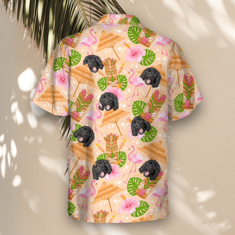 Bright, colorful custom Hawaiian shirts with tiki faces and tropical elements, perfect for BBQs and beach outings. Shirts with faces on them for a festive look.