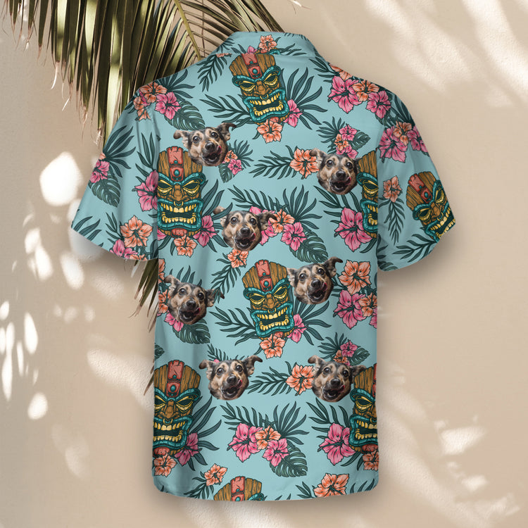 Fun custom Hawaiian shirts featuring tiki masks, tropical flowers, and green leaves. Personalize with faces on them for a standout, Polynesian vibe.