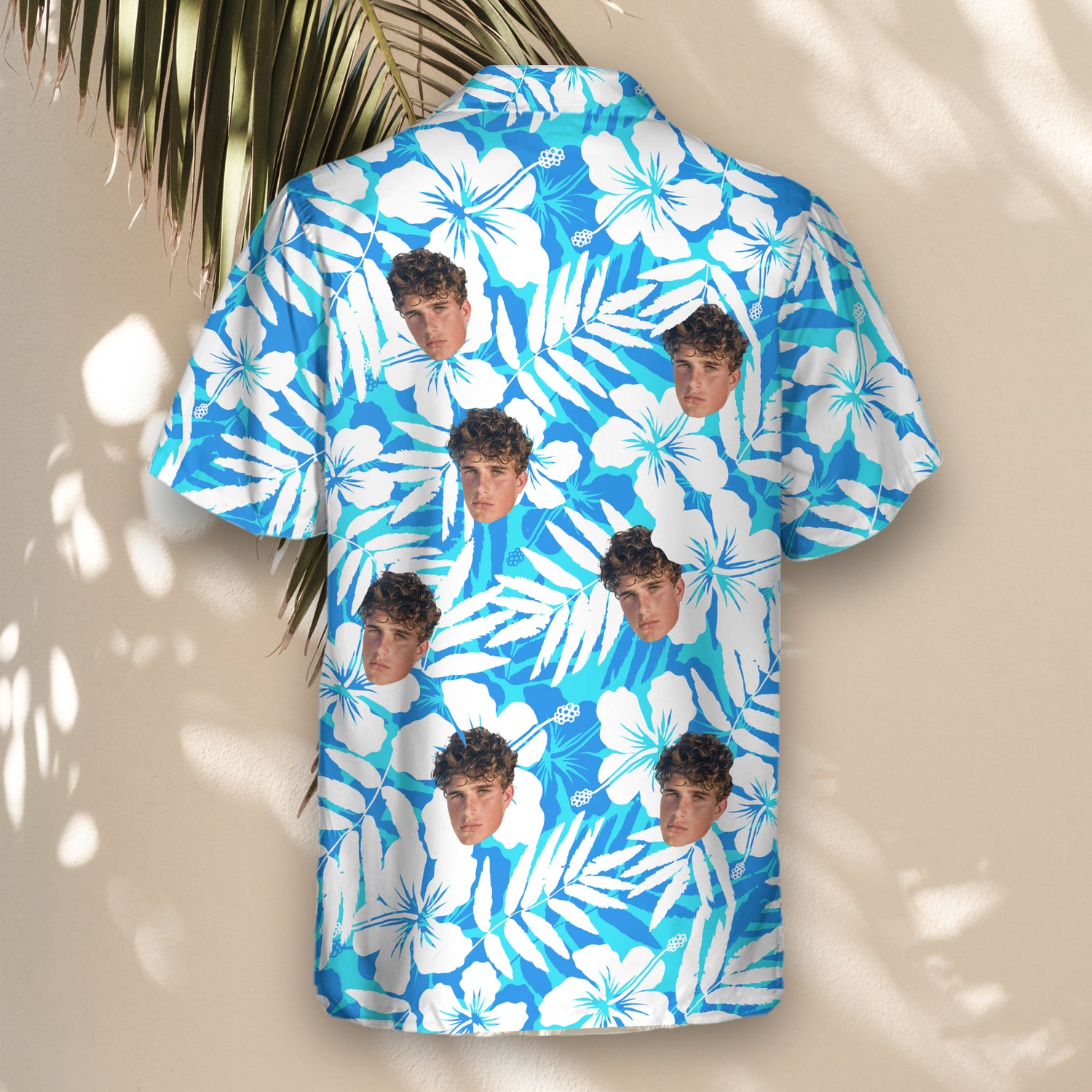 Custom Hawaiian shirts with hibiscus flower silhouettes and shirts with faces on them, in a fresh blue and white design, perfect for adding tropical flair to any event.