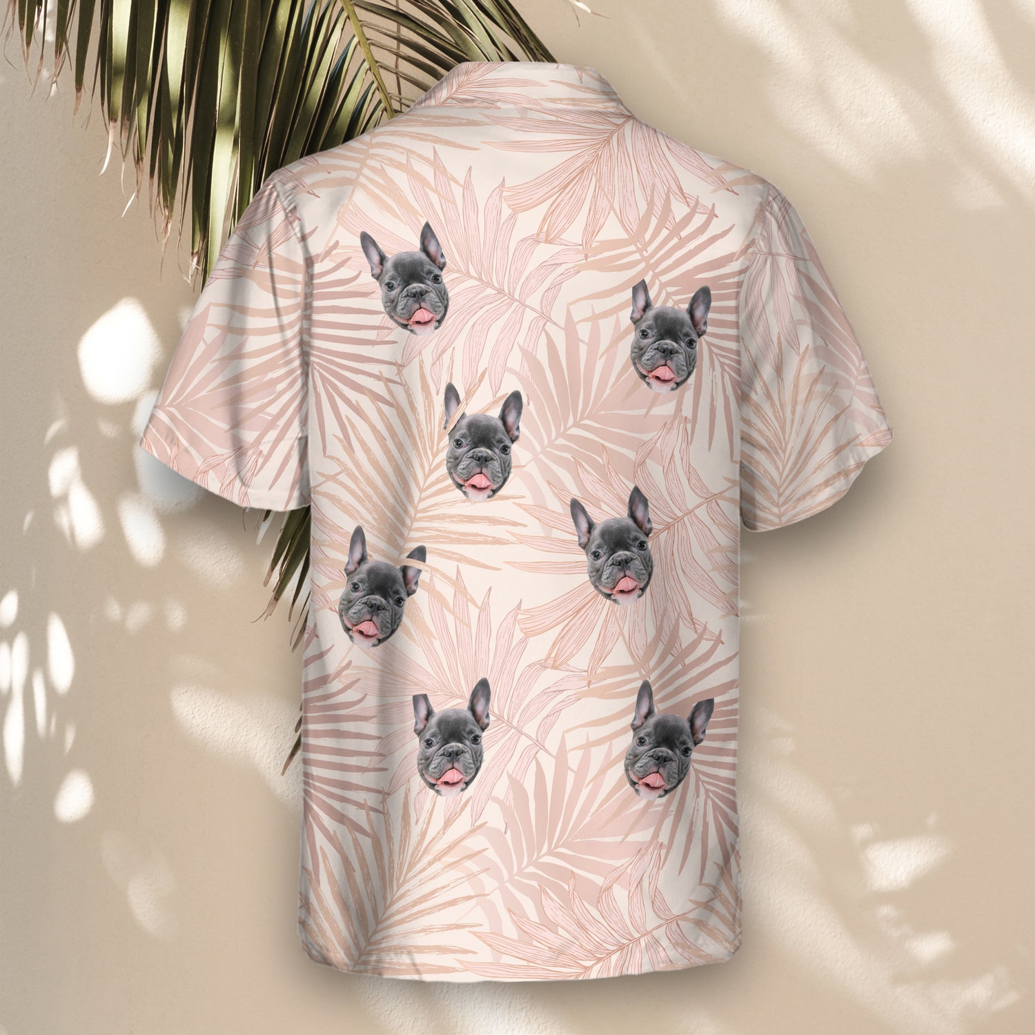 Soft pastel blush custom Hawaiian shirts with faces on them, featuring tropical leaves, perfect for a lightweight, fun, and unique summer wardrobe addition.