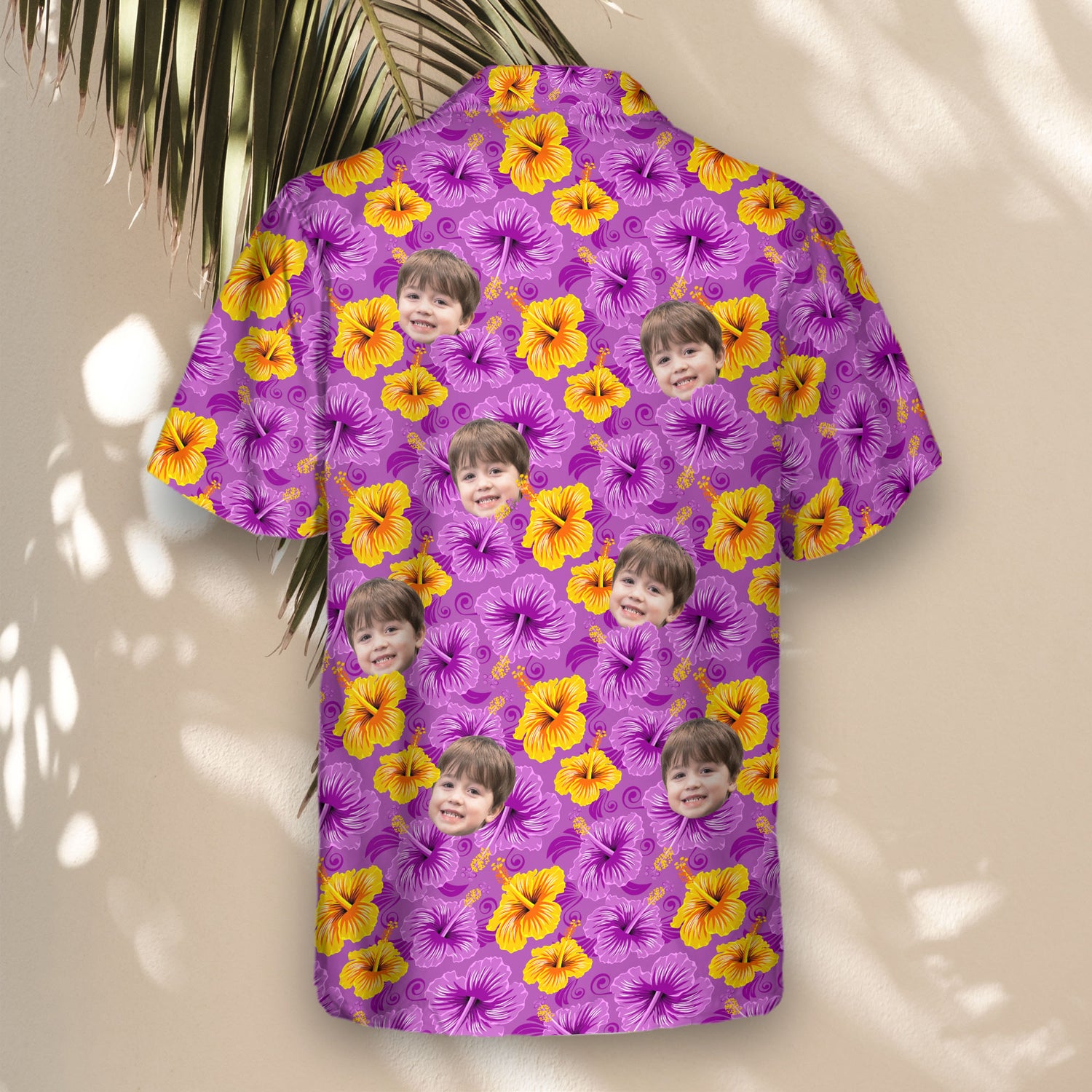 Tropical paradise Hawaiian shirts with faces on them, designed with bold purple and yellow hibiscus flowers.