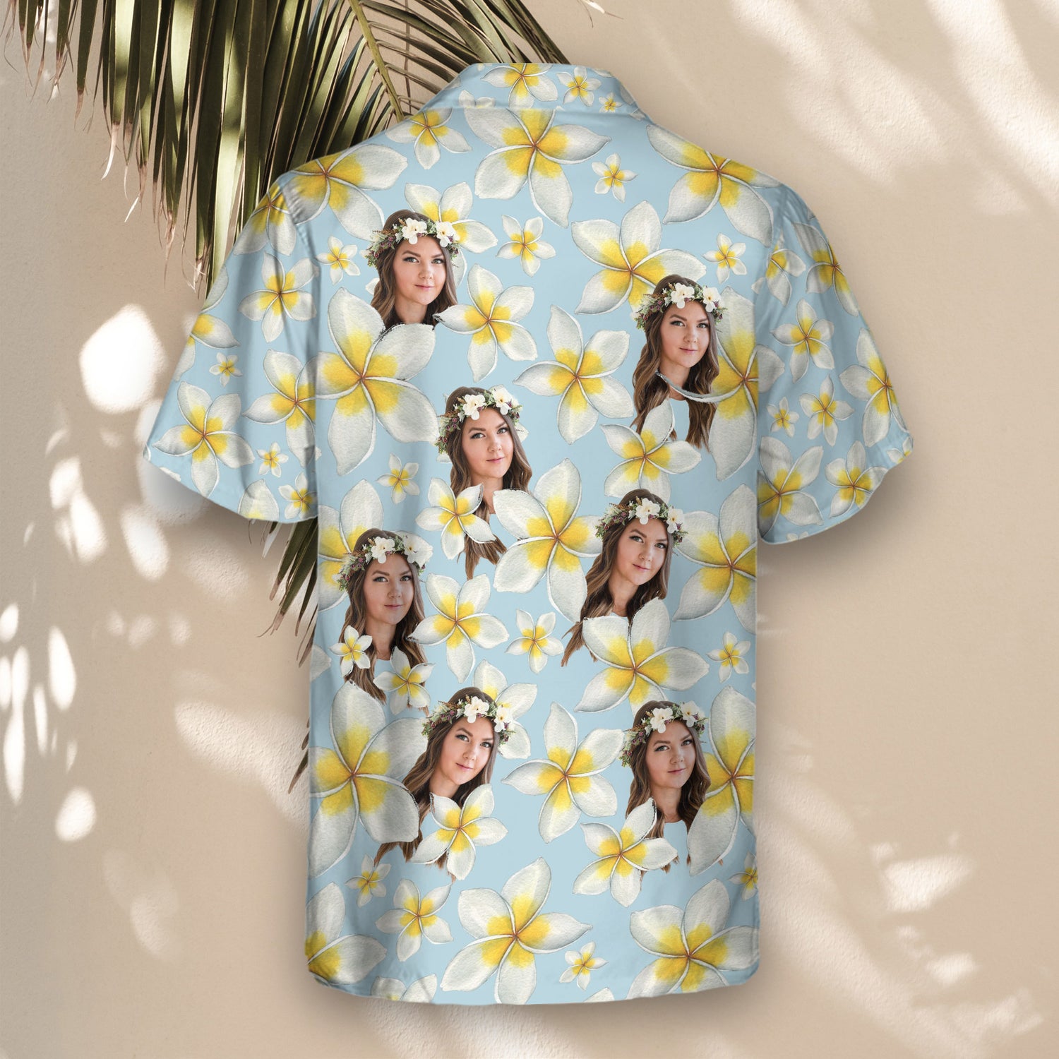 Tropical custom Hawaiian shirts with faces on them, showcasing blue and white frangipani flowers, perfect for lightweight comfort and stylish beach vibes.