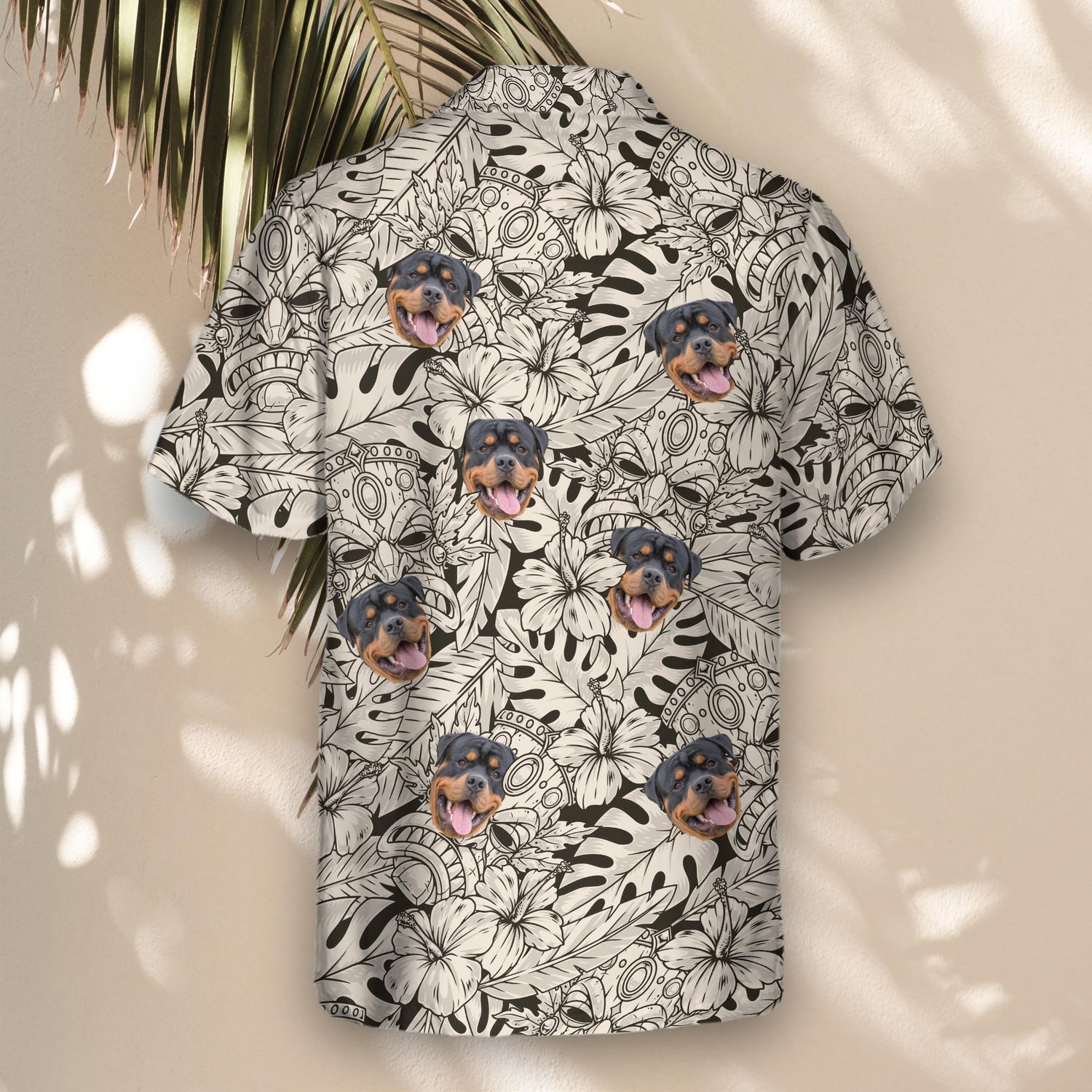 Custom Hawaiian shirts with Tiki masks in black and ivory tones, plus shirts with faces on them, perfect for a fun, lightweight, tropical island vibe.
