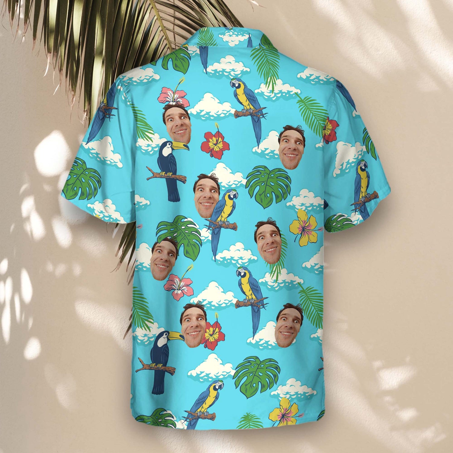 Stand out in custom Hawaiian shirts with faces on them, showcasing lively parrots, tropical plants, and paradise-inspired jungle designs.