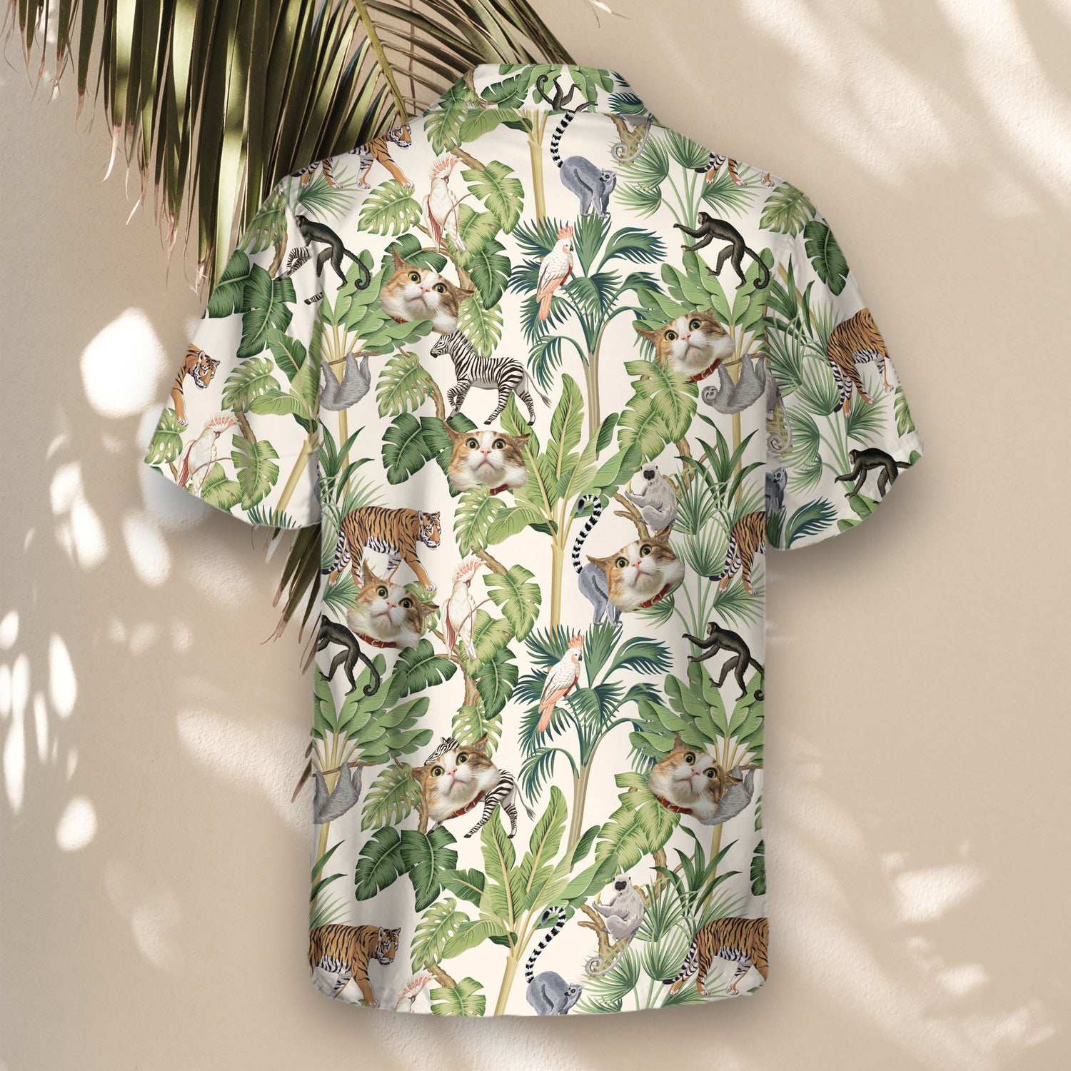 Shirts with faces on them, these custom Hawaiian shirts feature playful jungle animals like monkeys, zebras, and tigers among tropical foliage.