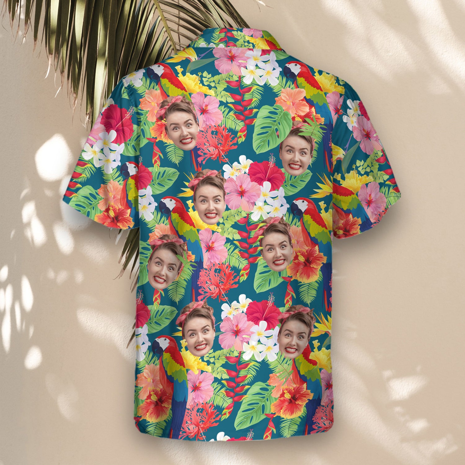 Lightweight custom Hawaiian shirts with faces on them, featuring colorful macaws and tropical leaves on Atlantic blue, ideal for any nature-themed occasion.