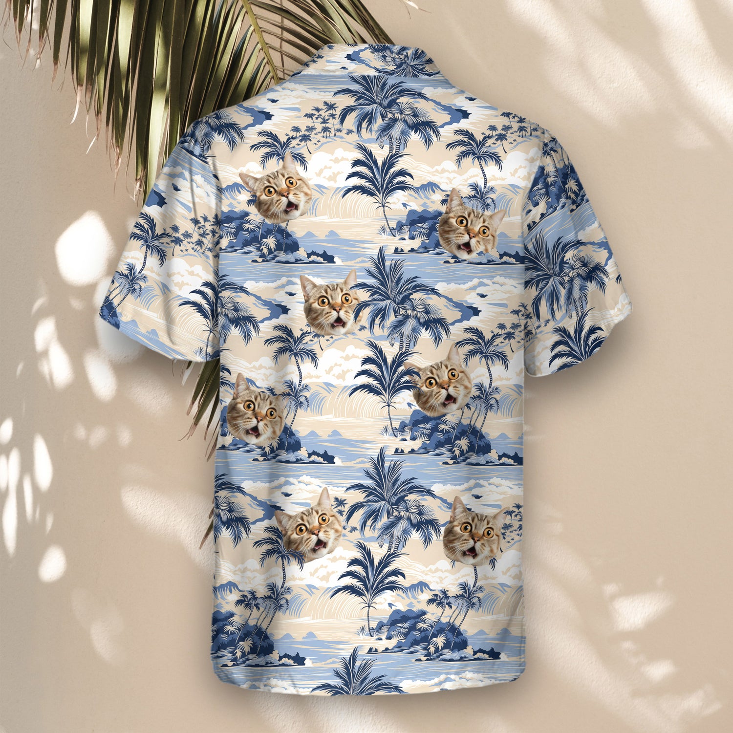 Fun custom Hawaiian shirts with faces on them, featuring vintage scenes of palm trees and ocean waves, perfect for a lightweight, stylish beach look.