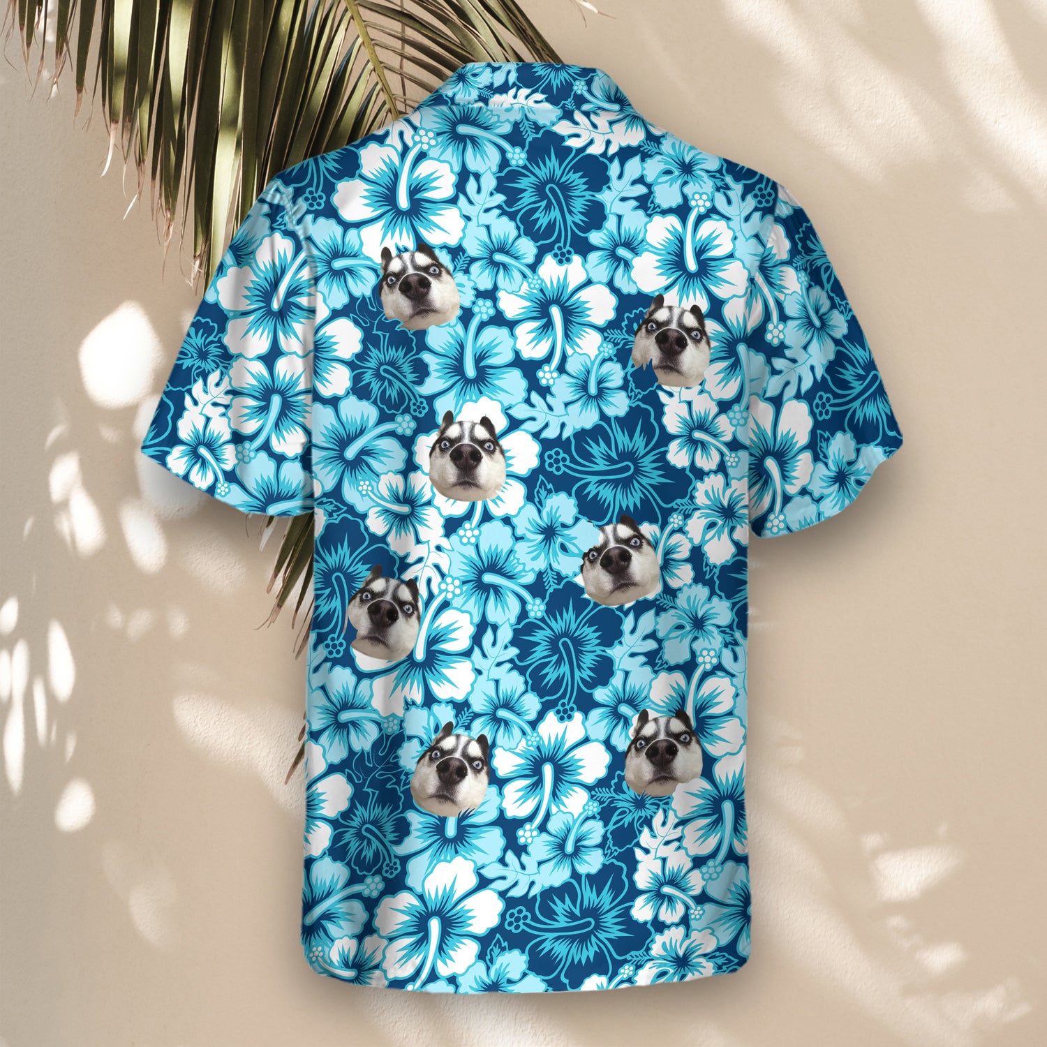 Tropical-themed custom Hawaiian shirts with faces on them, featuring blue hibiscus flower patterns. Perfect for beachwear, surfers, and summer vacations.
