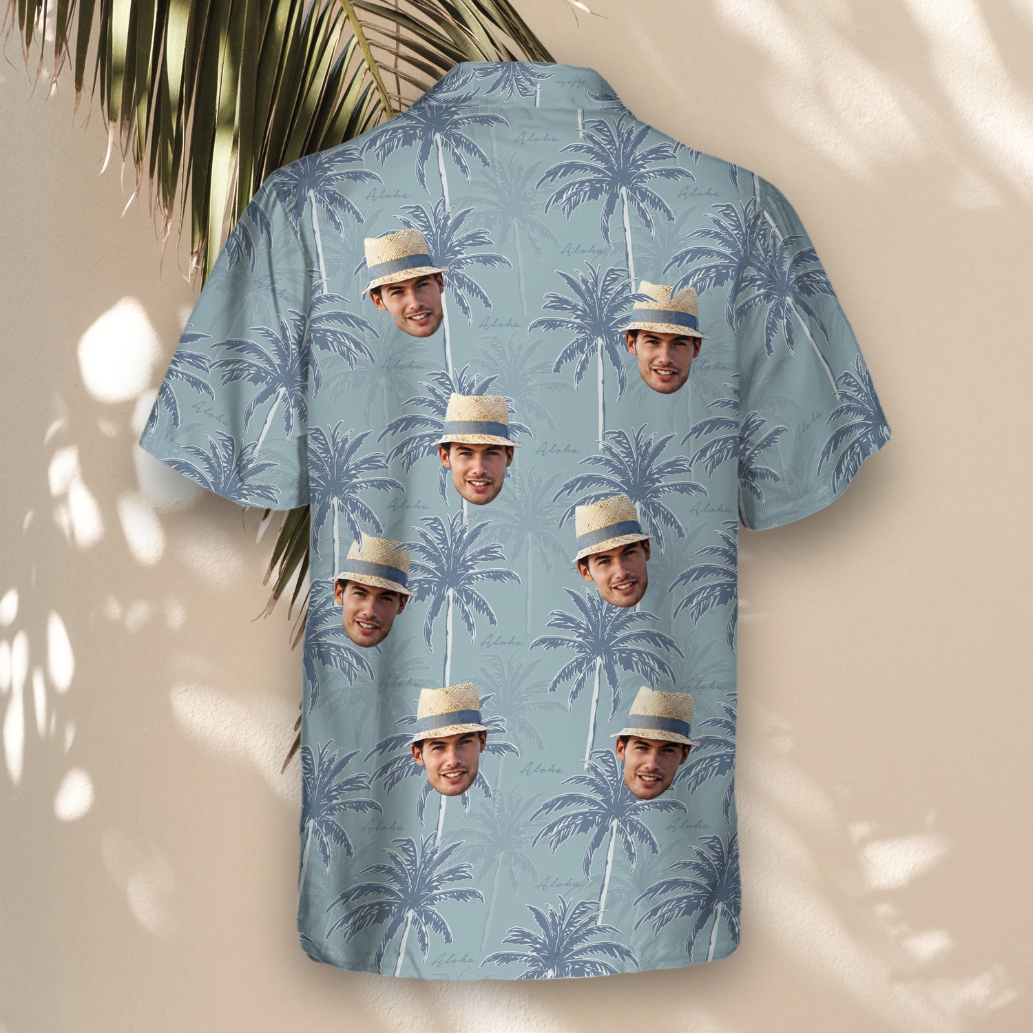Tropical custom Hawaiian shirts with navy blue palm trees on light blue. Add faces on them for a breezy, casual look perfect for any beach getaway.