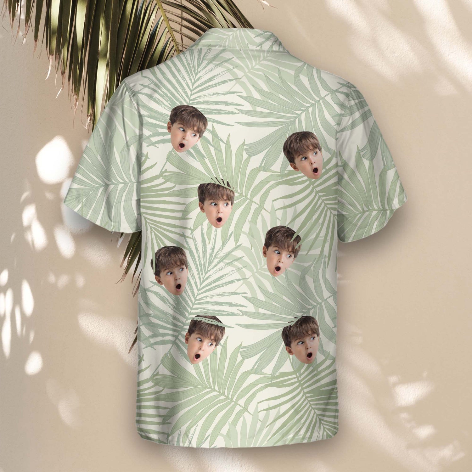Vibrant custom Hawaiian shirts with tropical leaf designs. Add faces on them for a relaxed, nature-inspired look that's perfect for any occasion.