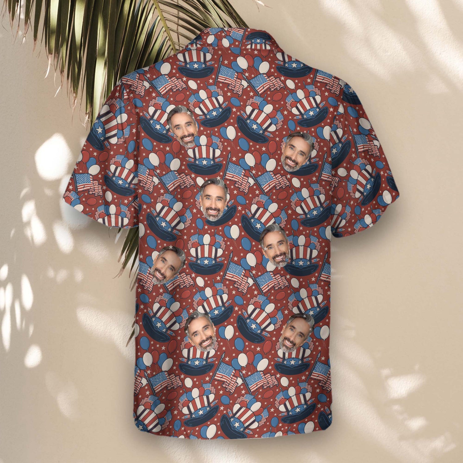 Celebrate in style with custom Hawaiian shirts featuring faces on them, decorated with flags, balloons, and Uncle Sam’s hat in a vibrant patriotic theme.