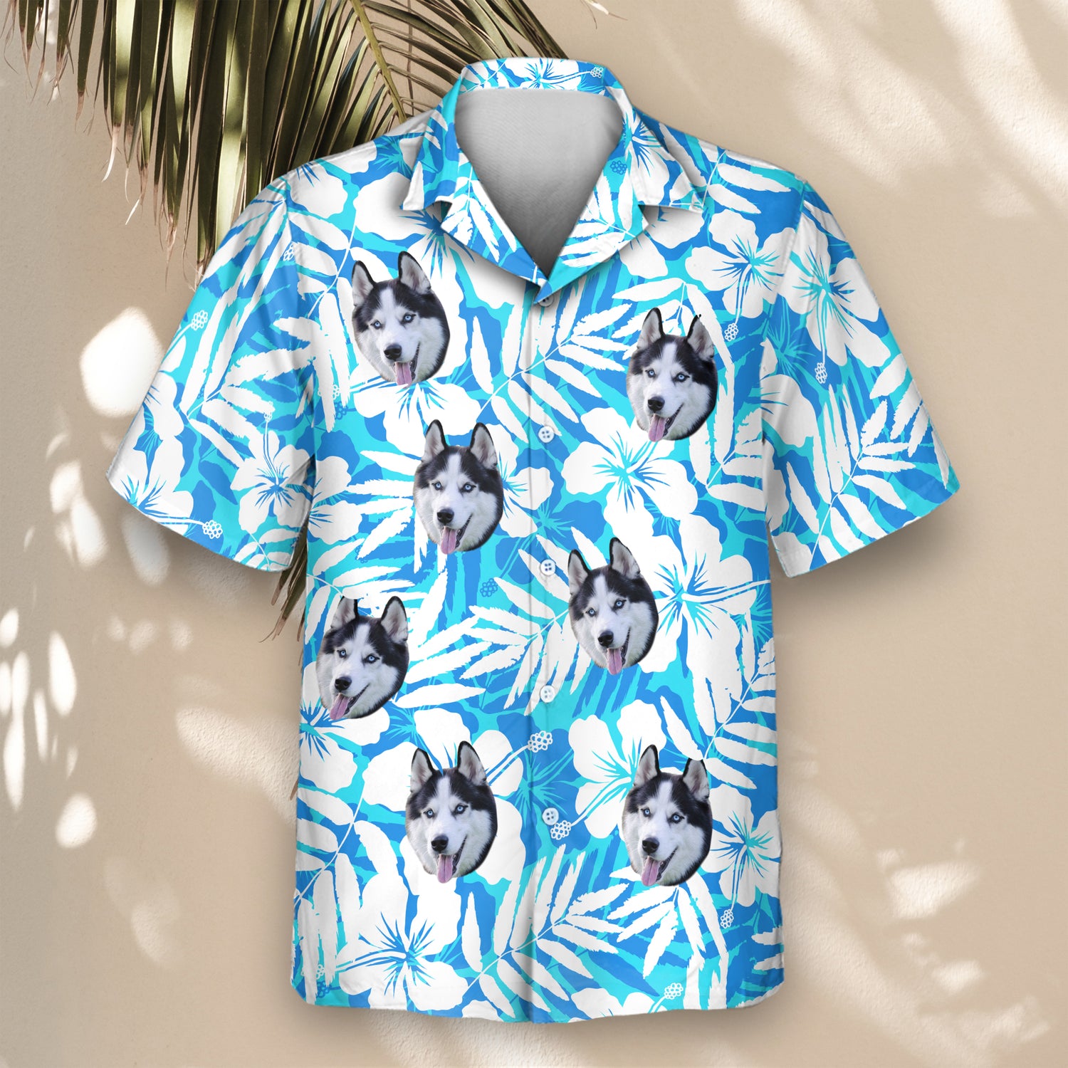 Stand out with custom Hawaiian shirts featuring hibiscus silhouettes and shirts with faces on them, offering lightweight, tropical vibes in blue and white.