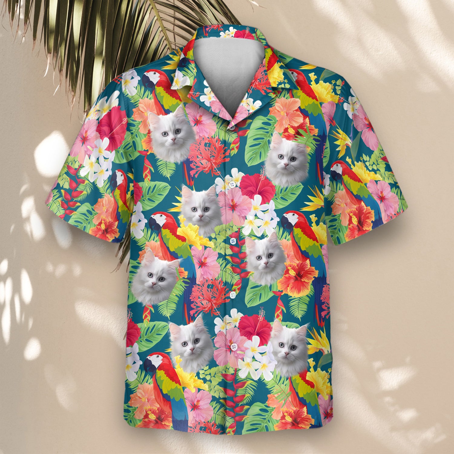 Stylish custom Hawaiian shirts with faces on them, adorned with macaws and tropical flowers in Atlantic blue, perfect for embracing the jungle vibe at events.
