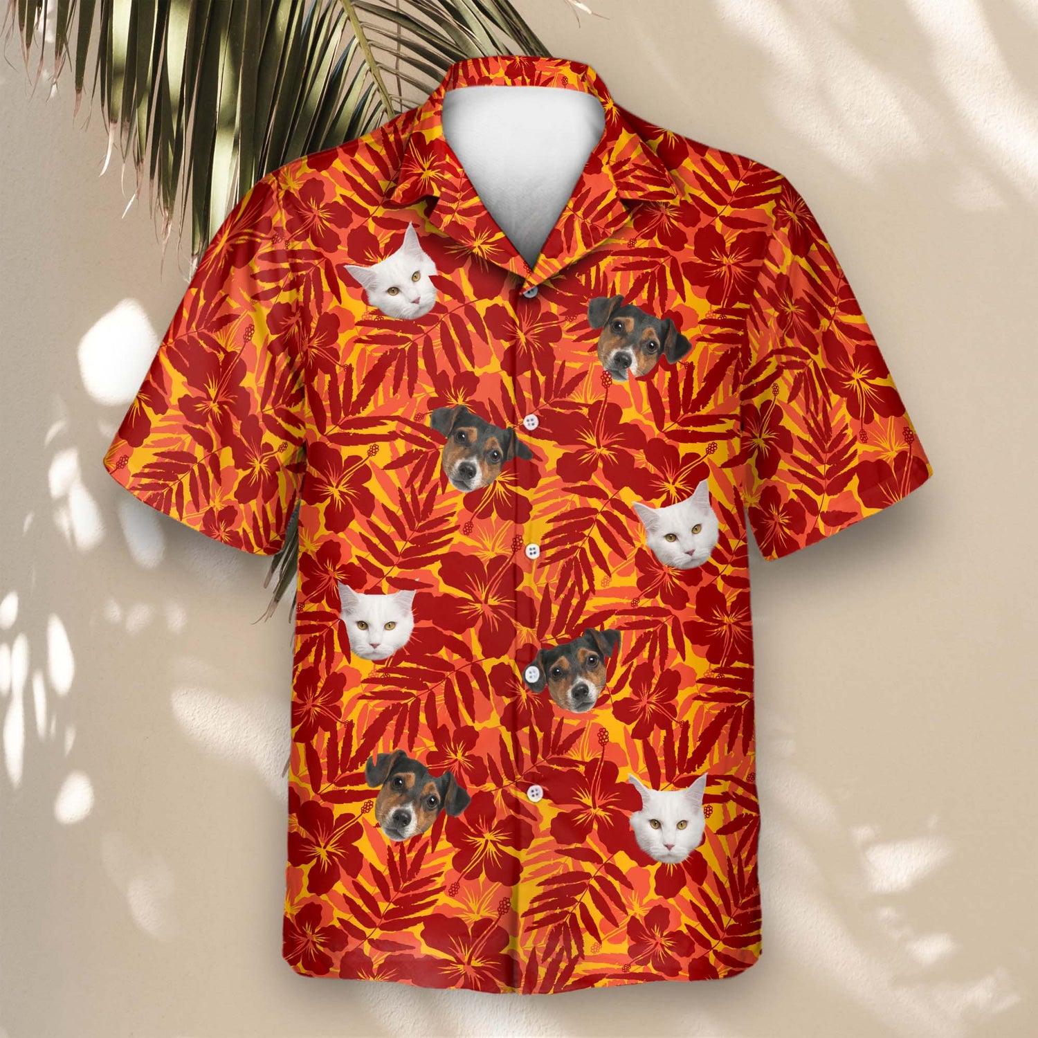 Stylish custom Hawaiian shirts with faces on them, featuring warm red and orange floral silhouettes with palm leaves, perfect for vacations and beach outings.