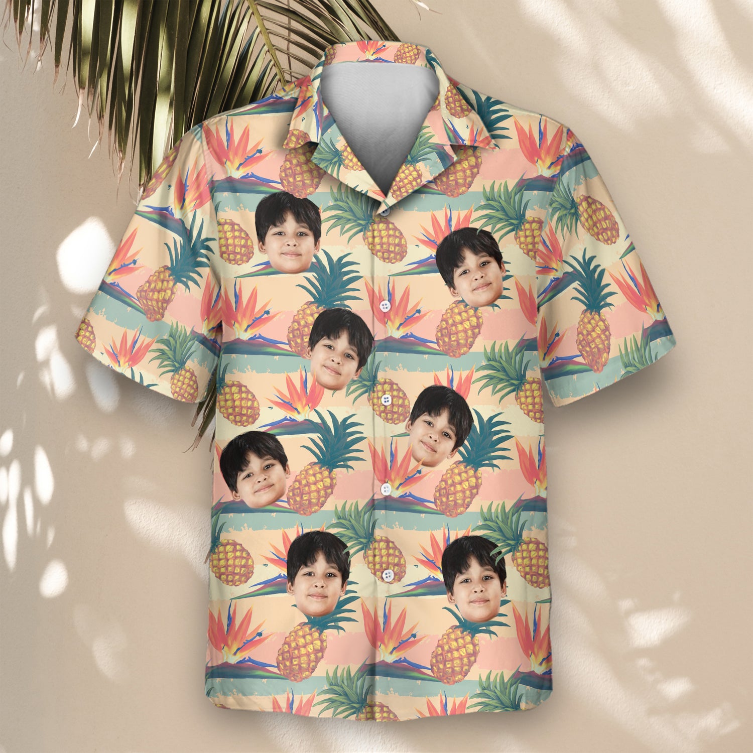 Playful custom Hawaiian shirts with faces on them, adorned with bright bird of paradise flowers and pineapples, ideal for bringing a fresh tropical style.