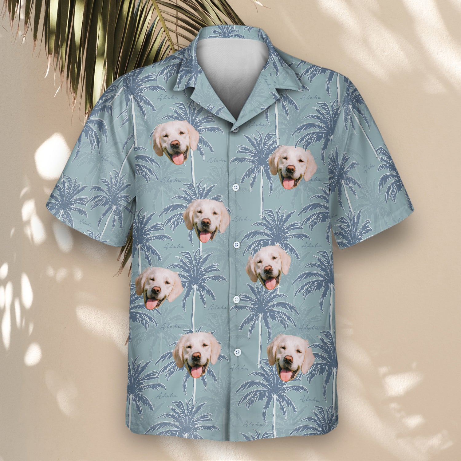 Custom Hawaiian shirts with palm trees in navy blue on a light background. Personalize with faces on them for a relaxed, tropical flair ideal for vacations.