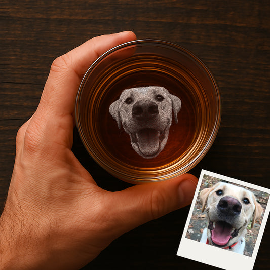 Unique personalized whiskey glass gift for pet parents, etched with a pet picture, styled with moody lighting and elegant drink setup.