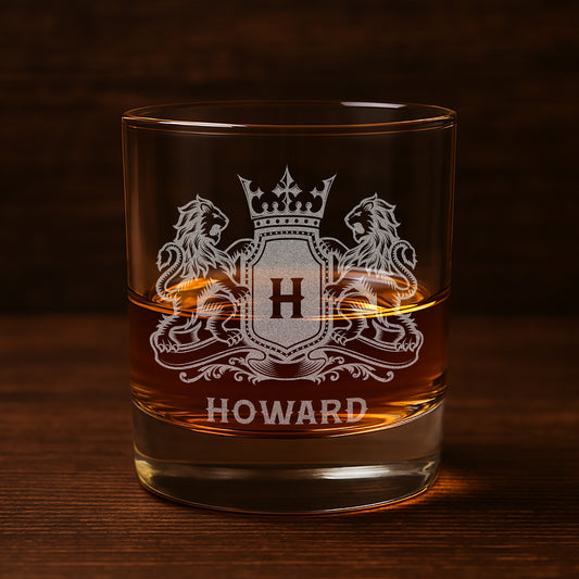 Custom engraved lion and shield whiskey glass with a name and a monogram.
